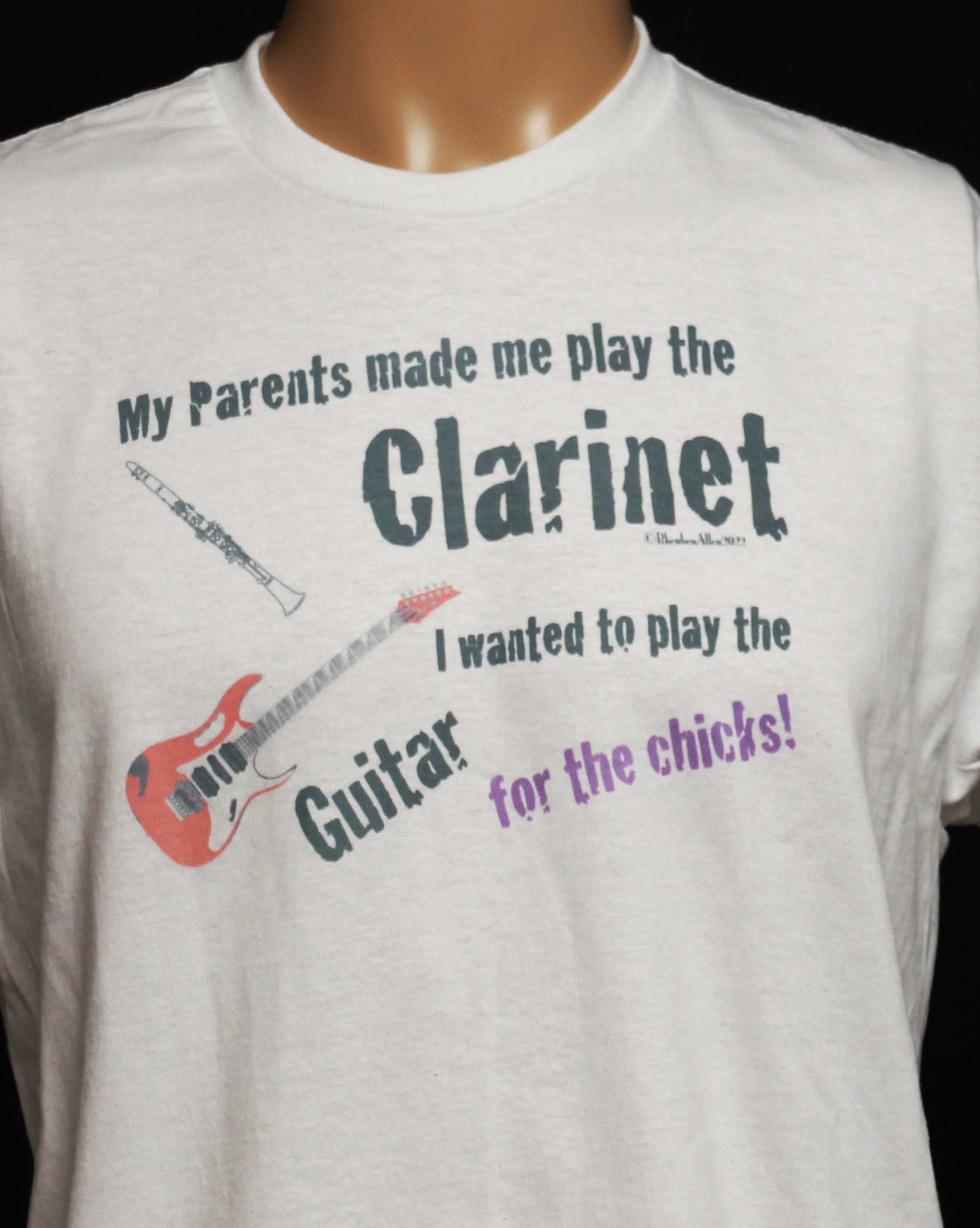 My parents made me play the clarinet.. I wanted to play the Guitar.. for the chicks!